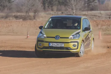 Volkswagen UP cornering on our safe driving track