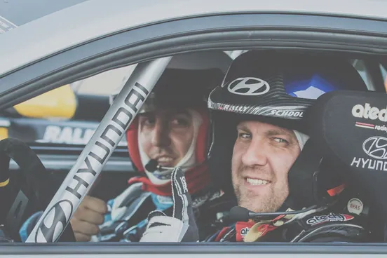 A smiling Vasil Jekov ready at the start line of a rally race