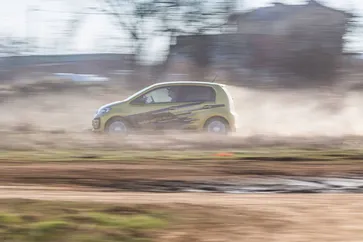 Vasil Jekov in the car with a student practising correct steering grip techniques