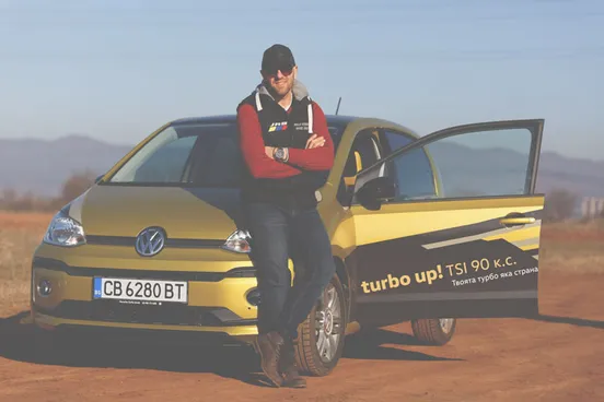 Vasil Jekov in front of the school Volkswagen at the rally track
