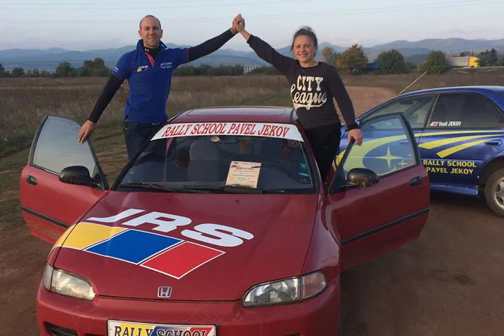 Vasil Jekov and Margarita greeting each other in our Honda race car